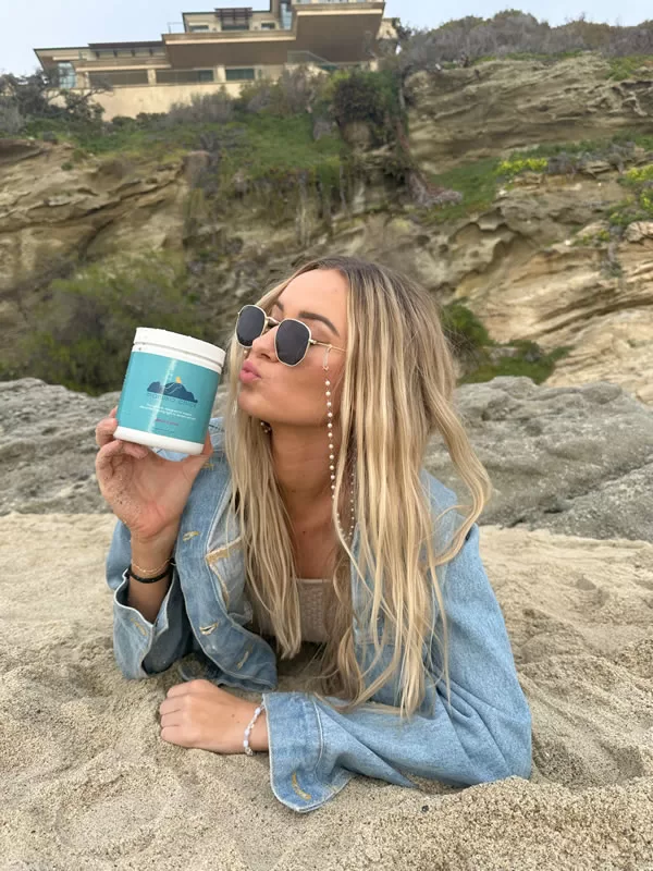 Woman holding PMS supplement